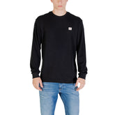 Image 1 : Pull Calvin Klein Jeans homme noir col rond manches longues vue face — Delvale