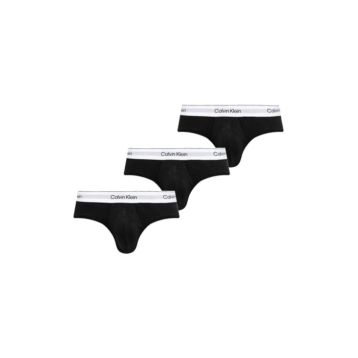 Image 1 : Lot de 3 slips Calvin Klein Underwear homme noirs avec ceinture élastique blanche logotée, vue d'ensemble en diagonal — Delvale