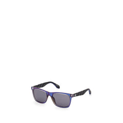 Image 1 : Lunettes de soleil Adidas Originals Navigator homme, monture carrée violet dégradé et branches noires texturées, vue de trois quarts — Delvale