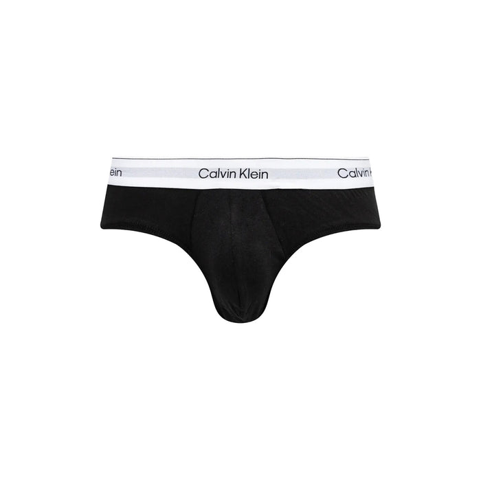 Image 2 : Détail de la ceinture élastique blanche avec inscription Calvin Klein répétée sur slip noir homme — Delvale