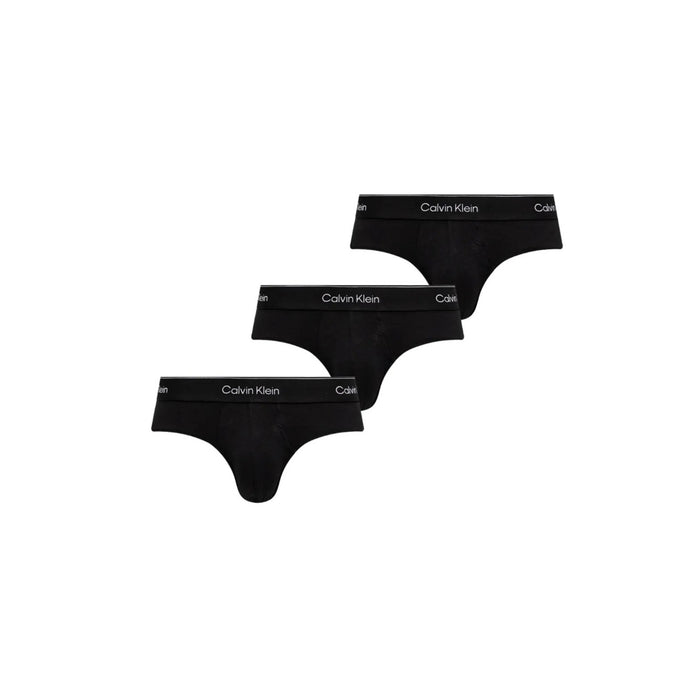Image 5 : Slip homme Calvin Klein Underwear noir isolé sur fond blanc, mise en valeur du tissu coton — Delvale