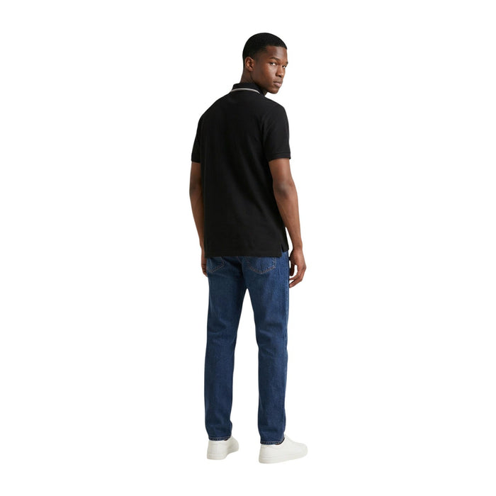 Polo Colmar Originals homme noir écusson logo brodé sur la manche